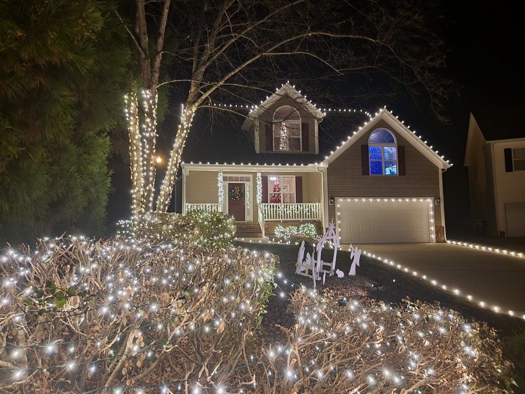 house with Christmas lightsa